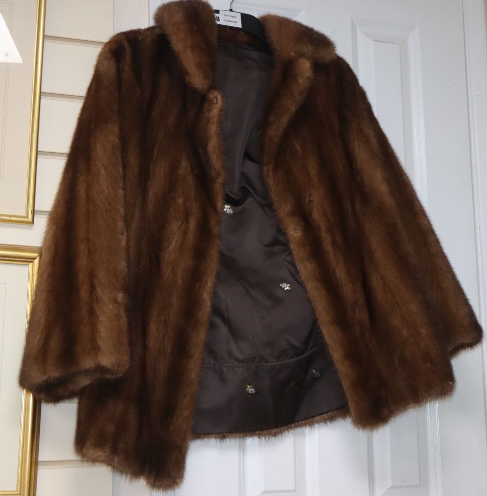 A brown mink jacket with embroidered lining